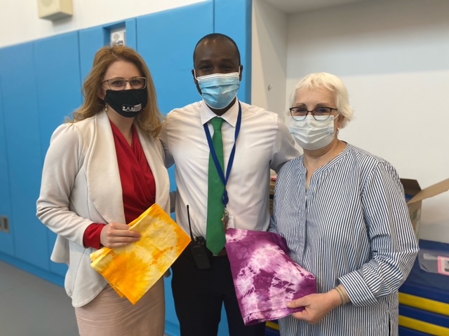 Pictured left to right: Erin Callaway (Community Family Life Services), Dr. Hewan (Shriver prinicpal), and Mrs. Sater (parent)